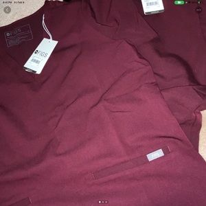 Figs scrub set. Joggers and top medium.  New burgundy did not fit. Paid over 95